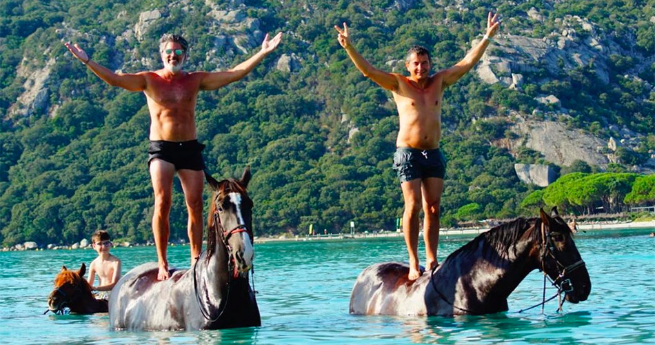 Horseback riding on the beach Horseback riding and swimming on the beach in Southern Corsica